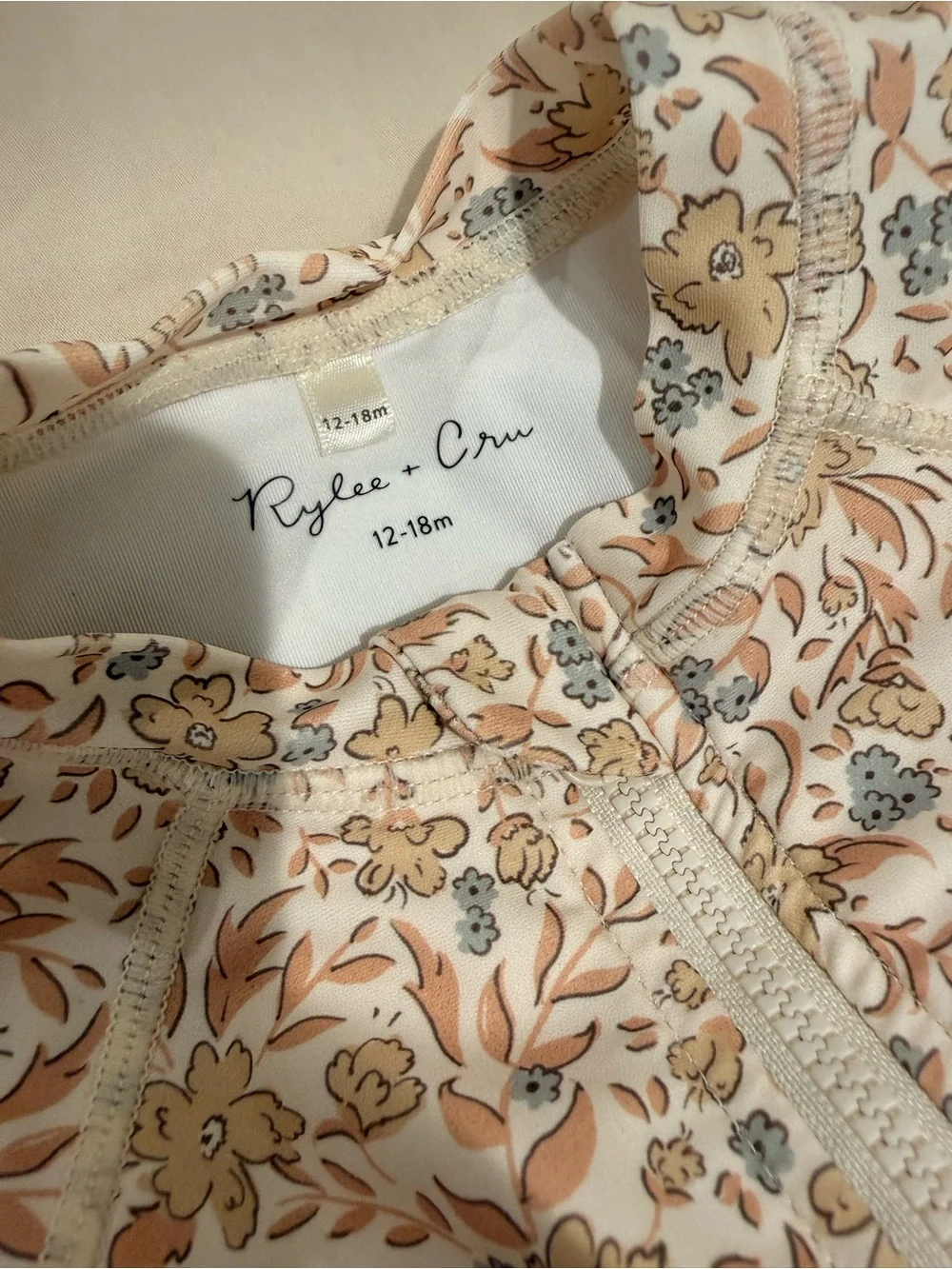Rylee + Cru Floral Long-Sleeve swimsuit